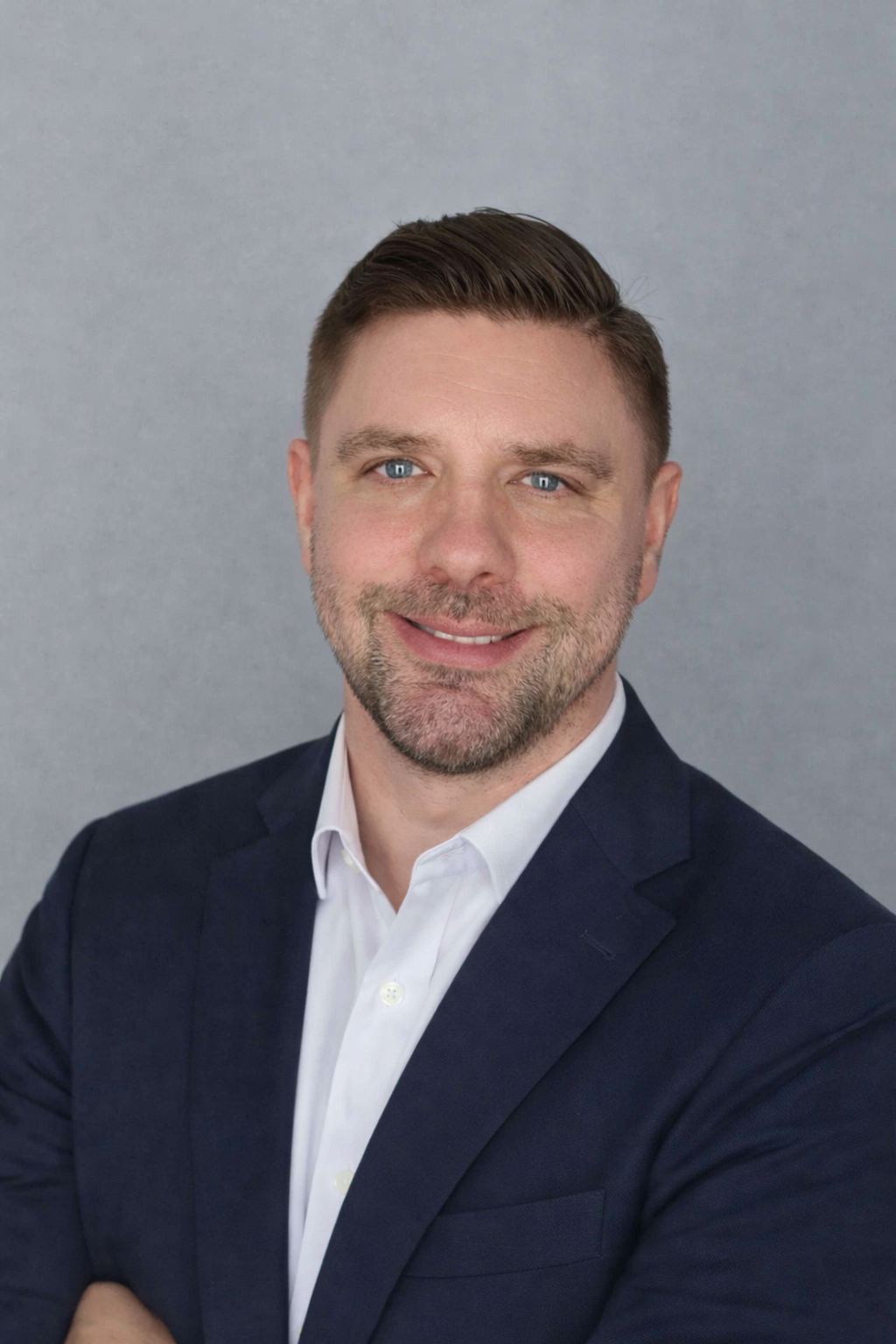 Professional headshot of Kevin Linn, a clinical team member, shown in a clean and professional portrait style.